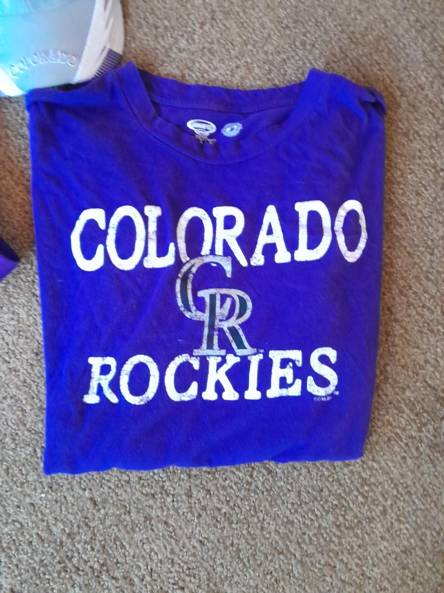 Colorado Rockies Apparel Shirts, hat and cooler bag