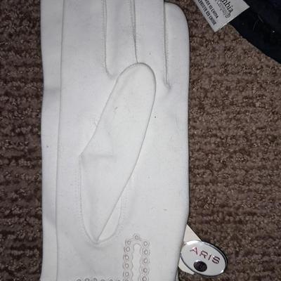 Winter wear, White, Black, and Gray scarves with a pair of Columbia gloves and stocking cap