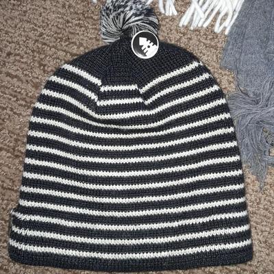 Winter wear, White, Black, and Gray scarves with a pair of Columbia gloves and stocking cap