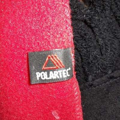 Winter wear, Red and black scarves with white gloves and a red hat