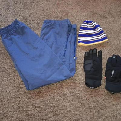 Winter wear, Gore-Tex Size XL snow pants with men's large gloves, and a beanie hat