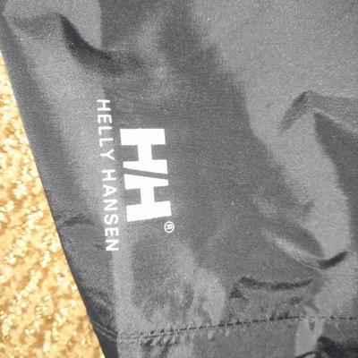 Two pair of Men's pants 38/ 32 Under armor and XL Helly Hansen