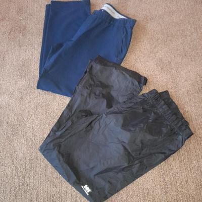 Two pair of Men's pants 38/ 32 Under armor and XL Helly Hansen