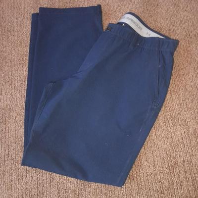 Two pair of Men's pants 38/ 32 Under armor and XL Helly Hansen