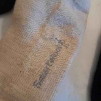 Men's lightly used socks Smart wool, Under armor, and more