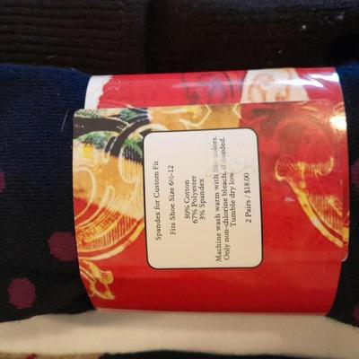 Men's lightly used socks Smart wool, Under armor, and more