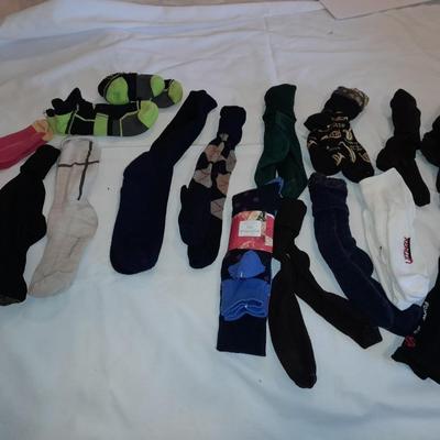 Men's lightly used socks Smart wool, Under armor, and more