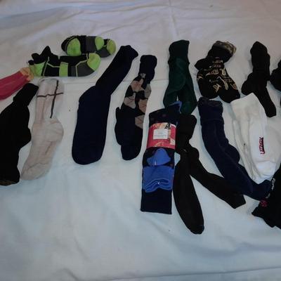 Men's lightly used socks Smart wool, Under armor, and more