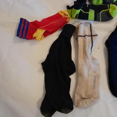 Men's lightly used socks Smart wool, Under armor, and more
