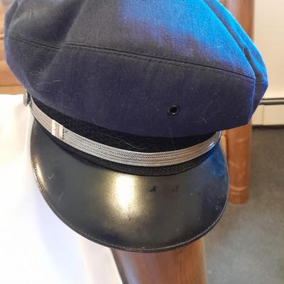Two vintage hats - England made Clery's Showerproof Dublin cap - Trailways Driver's Cap