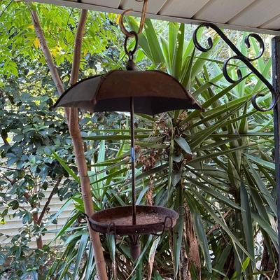 Wrought iron umbrella bird feeder