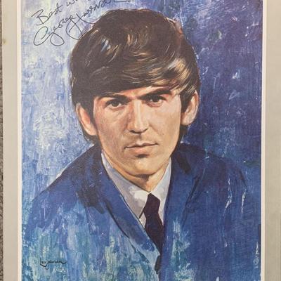 George Harrison signed photo. GFA Authenticated