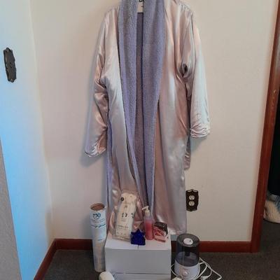 Her home spa day bath robe with items of luxury massager, humidifier, thera-sox and more