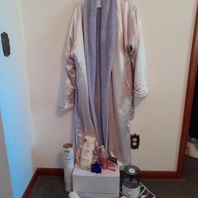Her home spa day bath robe with items of luxury massager, humidifier, thera-sox and more