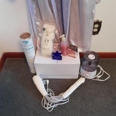 Her home spa day bath robe with items of luxury massager, humidifier, thera-sox and more