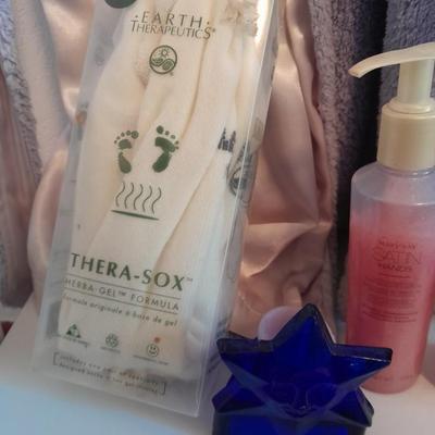 Her home spa day bath robe with items of luxury massager, humidifier, thera-sox and more