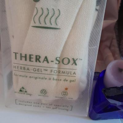 Her home spa day bath robe with items of luxury massager, humidifier, thera-sox and more