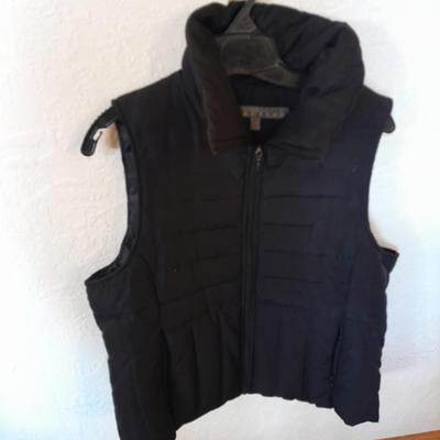 REI Down purple Ladies coat and a black Reaction vest