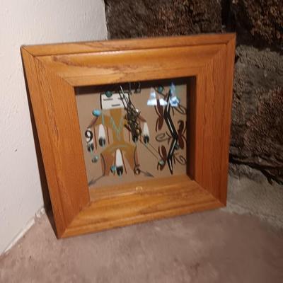 Signed Big Thunder Navaho sand art clock with turquoise stones.