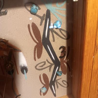 Signed Big Thunder Navaho sand art clock with turquoise stones.