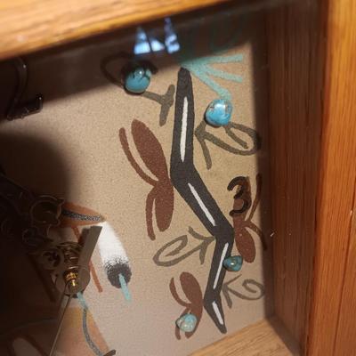 Signed Big Thunder Navaho sand art clock with turquoise stones.