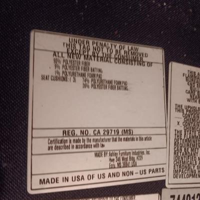 Ashley Furniture Industries faux leather couch