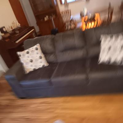 Ashley Furniture Industries faux leather couch