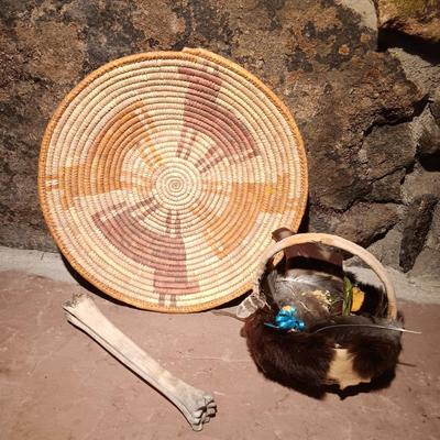 15" woven coil basket with small divination object basket decorated with feathers and fur