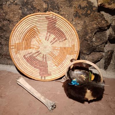 15" woven coil basket with small divination object basket decorated with feathers and fur