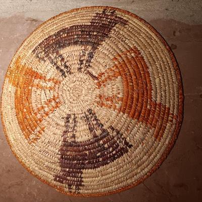 15" woven coil basket with small divination object basket decorated with feathers and fur