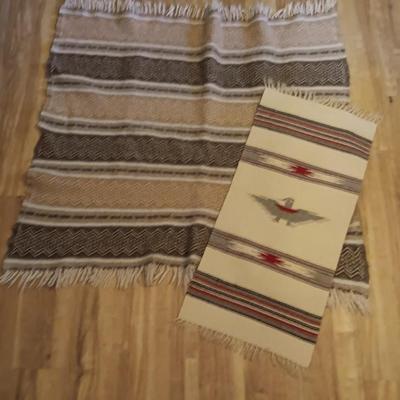 Two woven wall rugs / table runners