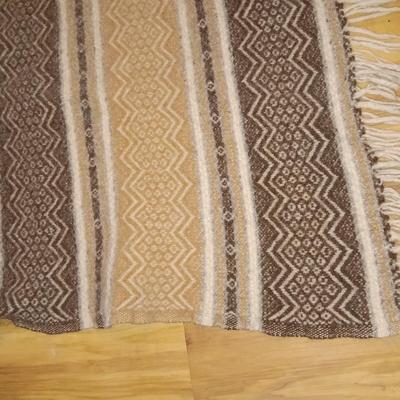 Two woven wall rugs / table runners