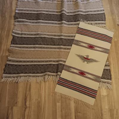 Two woven wall rugs / table runners