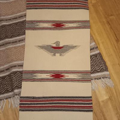 Two woven wall rugs / table runners