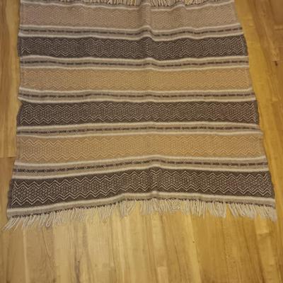 Two woven wall rugs / table runners