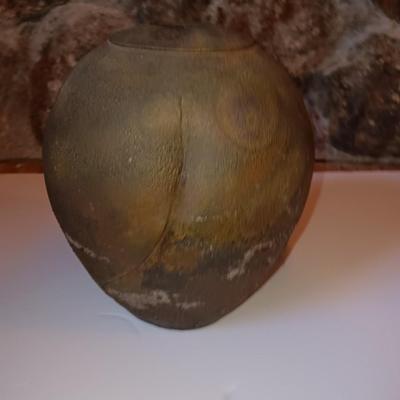 Vintage pottery vase moon jar shaped Signed on base.