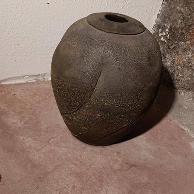 Vintage pottery vase moon jar shaped Signed on base.