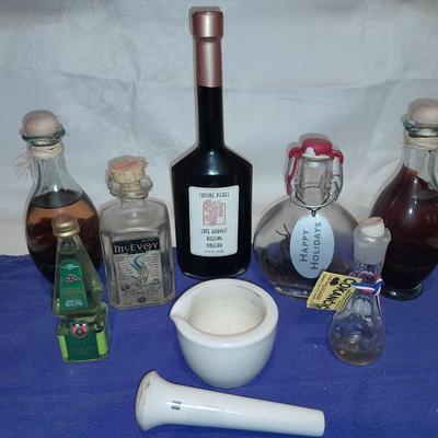 Cooking oil and vinegar collectible jars with COORS Mortar and pestle