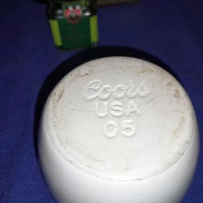 Cooking oil and vinegar collectible jars with COORS Mortar and pestle