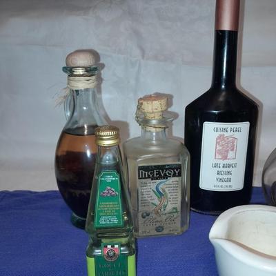 Cooking oil and vinegar collectible jars with COORS Mortar and pestle