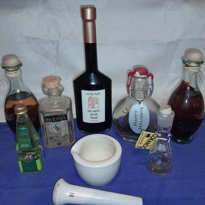 Cooking oil and vinegar collectible jars with COORS Mortar and pestle