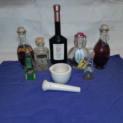 Cooking oil and vinegar collectible jars with COORS Mortar and pestle