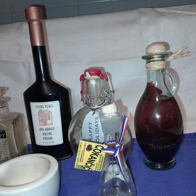 Cooking oil and vinegar collectible jars with COORS Mortar and pestle