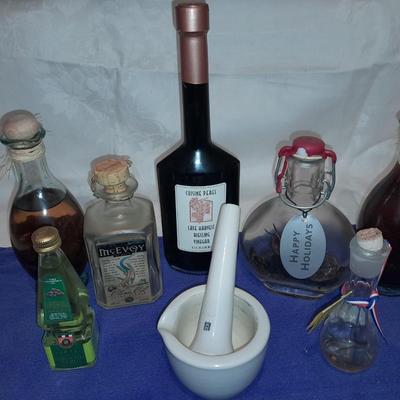 Cooking oil and vinegar collectible jars with COORS Mortar and pestle