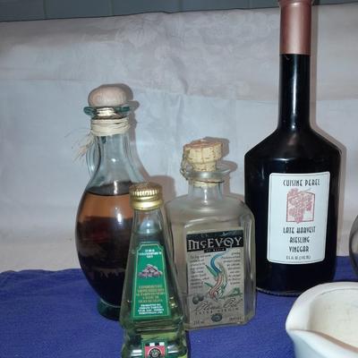 Cooking oil and vinegar collectible jars with COORS Mortar and pestle