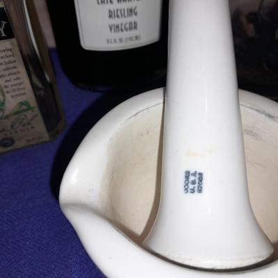 Cooking oil and vinegar collectible jars with COORS Mortar and pestle