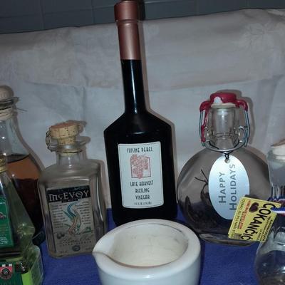 Cooking oil and vinegar collectible jars with COORS Mortar and pestle
