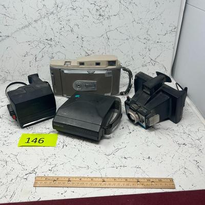 4 Vintage Polaroid Cameras