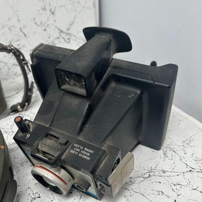 4 Vintage Polaroid Cameras