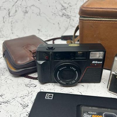 Vintage point & shoot cameras & cases